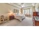 Spacious main bedroom with tray ceilings, plantation shutters, and a calming color palette at 9809 Gerald Ct, Las Vegas, NV 89134