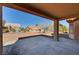 Backyard covered patio with a view of desert landscaping provides a relaxing outdoor living space at 9912 Woodhouse Dr, Las Vegas, NV 89134