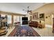 Spacious living room with tile flooring, ceiling fan, and traditional furnishings at 9912 Woodhouse Dr, Las Vegas, NV 89134