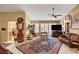 Spacious living room with tile flooring, ceiling fan, and traditional furnishings at 9912 Woodhouse Dr, Las Vegas, NV 89134