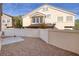 Enclosed backyard showcasing a gravel area and a concrete patio at 1292 Large Cap Dr # 3, Henderson, NV 89074