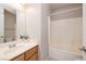Clean bathroom featuring a single sink vanity and a tub/shower combo at 1292 Large Cap Dr # 3, Henderson, NV 89074