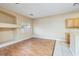 Open-concept living area with built-in alcove and tile/laminate flooring at 1292 Large Cap Dr # 3, Henderson, NV 89074