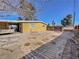 Large backyard featuring covered patio area, offering outdoor living and perfect for relaxing or entertaining at 2324 E Oakey Blvd, Las Vegas, NV 89104