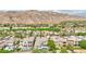 Aerial view highlighting luxury homes with pools in a golf course community at 2690 Grassy Spring Pl, Las Vegas, NV 89135