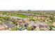 Panoramic aerial view of luxury homes with golf course and lush desert landscaping at 2690 Grassy Spring Pl, Las Vegas, NV 89135