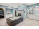 Modern bathroom with a soaking tub, double vanities, and a walk-in closet for a spa-like experience at 2690 Grassy Spring Pl, Las Vegas, NV 89135