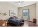 Cozy bedroom with a queen-sized bed and ample natural light at 2690 Grassy Spring Pl, Las Vegas, NV 89135