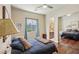 Comfortable bedroom with large window and mirrored closet at 2690 Grassy Spring Pl, Las Vegas, NV 89135