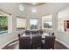 Circular dining room with ample natural light provides stunning views of the backyard pool at 2690 Grassy Spring Pl, Las Vegas, NV 89135