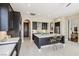 Modern kitchen with a large island, stainless steel appliances, and sleek cabinetry at 2690 Grassy Spring Pl, Las Vegas, NV 89135