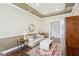 Well-lit living room with stylish decor, wood floors, and open layout at 2690 Grassy Spring Pl, Las Vegas, NV 89135