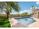 Inviting pool area with a large pool, spa, and well-manicured landscaping at 2690 Grassy Spring Pl, Las Vegas, NV 89135