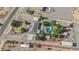 Expansive property featuring lush landscaping, an inviting pool, ample parking, and scenic surroundings at 2901 S Dandelion St, Pahrump, NV 89048