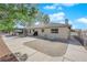 A large backyard with a mix of concrete and paved brick surfaces. The backyard also features desert landscaping at 2901 S Dandelion St, Pahrump, NV 89048
