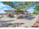 Extensive backyard patio area with stone accents and ample space for outdoor enjoyment at 2901 S Dandelion St, Pahrump, NV 89048