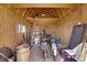 Interior view of the barn with a ladder to the loft, offering substantial storage at 2901 S Dandelion St, Pahrump, NV 89048