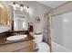 A traditional bathroom with a shower and granite counter at 2901 S Dandelion St, Pahrump, NV 89048