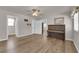Bedroom view showcasing hardwood floors, ceiling fan, and neutral paint tones at 2901 S Dandelion St, Pahrump, NV 89048