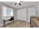 Cozy bedroom featuring wood-look flooring, a window, and a closet at 2901 S Dandelion St, Pahrump, NV 89048