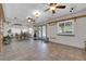 Large bonus room with tile flooring and French doors providing indoor/outdoor living at 2901 S Dandelion St, Pahrump, NV 89048