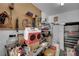 Inside the garage, pegboard and shelving on the walls offer organized storage solutions for tools and equipment at 2901 S Dandelion St, Pahrump, NV 89048