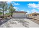 A detached garage with a concrete driveway is featured at 2901 S Dandelion St, Pahrump, NV 89048