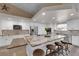 Open kitchen with a large granite island, stainless steel appliances, and ample counter space at 2901 S Dandelion St, Pahrump, NV 89048