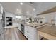 Open kitchen with a large island, stainless steel appliances, and easy access to the living space at 2901 S Dandelion St, Pahrump, NV 89048