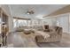 Spacious living room featuring cozy seating and a fireplace, ideal for Gathering gatherings at 2901 S Dandelion St, Pahrump, NV 89048
