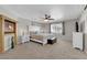 A spacious main bedroom with a fireplace and neutral tones at 2901 S Dandelion St, Pahrump, NV 89048