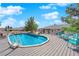 Backyard with a fenced pool and deck featuring patio furniture at 2901 S Dandelion St, Pahrump, NV 89048
