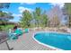 Image featuring an above-ground pool with decking and patio chairs at 2901 S Dandelion St, Pahrump, NV 89048