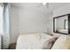 Bedroom featuring a full-sized bed and large window with curtain at 376 Shanon Springs St, Henderson, NV 89014