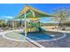 Outdoor playground with sun shade in community park at 376 Shanon Springs St, Henderson, NV 89014