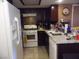 Well-equipped kitchen with stainless steel appliances and sleek dark wood cabinets at 3781 Desert Marina Dr # 101, Laughlin, NV 89029