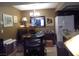 Eat-in kitchen featuring a charming chandelier and unique decorative wall art at 3781 Desert Marina Dr # 101, Laughlin, NV 89029