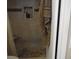 Shower with built-in shelving, pebble floor, and neutral tiling at 3781 Desert Marina Dr # 101, Laughlin, NV 89029