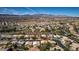 Home with a tile roof and mountain views in a mature, well-maintained neighborhood in a desert community at 4712 Stavanger Ln, Las Vegas, NV 89147