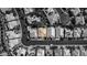 Aerial view of a home, showing its roofline and surrounding landscape at 4712 Stavanger Ln, Las Vegas, NV 89147