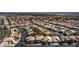 Overhead view of a residential neighborhood featuring neatly arranged houses and well-kept landscaping at 4712 Stavanger Ln, Las Vegas, NV 89147