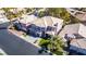 Nevada home with a tile roof in a manicured neighborhood with shade trees at 4712 Stavanger Ln, Las Vegas, NV 89147