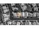 This is a black and white aerial view of the roofs of homes in a quiet neighborhood at 4712 Stavanger Ln, Las Vegas, NV 89147