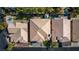 Top-down view of a home, highlighting its roof and surrounding outdoor space, including landscaping at 4712 Stavanger Ln, Las Vegas, NV 89147