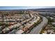 Aerial view of a residential neighborhood showcasing streets lined with well-maintained homes and desert landscape at 4712 Stavanger Ln, Las Vegas, NV 89147