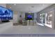 Spacious Gathering room with sliding glass doors and modern decor at 4712 Stavanger Ln, Las Vegas, NV 89147