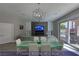 Open-concept living area with outdoor access and modern furnishings at 4712 Stavanger Ln, Las Vegas, NV 89147
