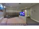 The main bedroom features soft carpet, recessed lights, and a large wall mounted television at 4712 Stavanger Ln, Las Vegas, NV 89147