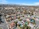 Expansive aerial view of a residential area with city skyline, showcasing numerous homes and community layout at 5050 Grandview Dr, Las Vegas, NV 89120