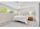 Inviting bedroom featuring a large window, neutral colors and a ceiling fan at 5050 Grandview Dr, Las Vegas, NV 89120